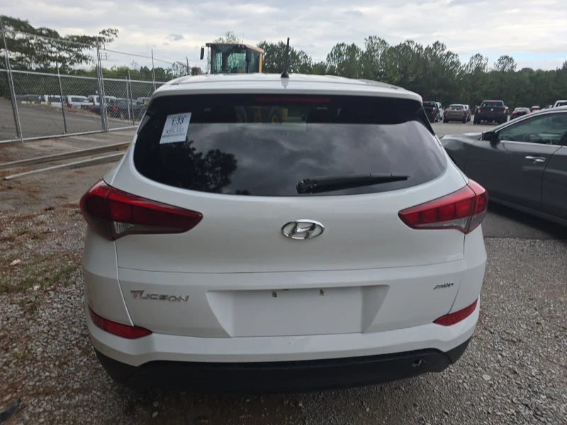 Hyundai Tucson AWD  2.0L , снимка 4 - Автомобили и джипове - 47494311