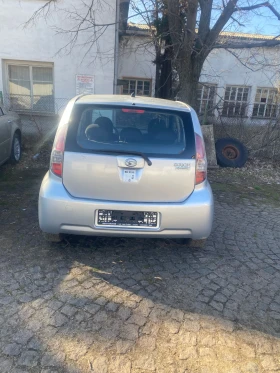 Daihatsu Sirion 1000 кубика 75 к.с климатик, снимка 2