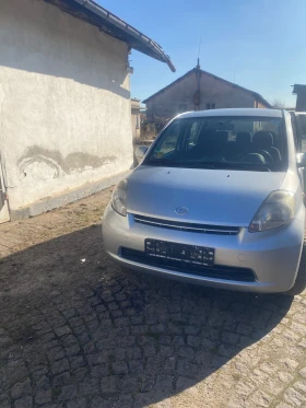 Daihatsu Sirion 1000 кубика 75 к.с климатик, снимка 1