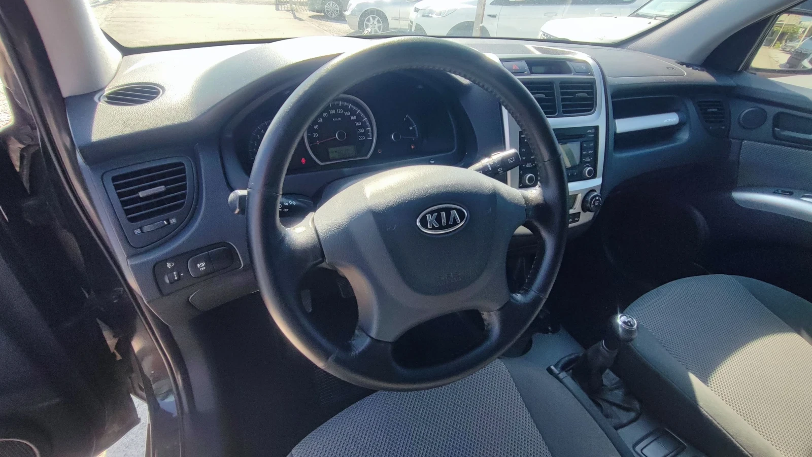 Kia Sportage 2.0i, снимка 10 - Автомобили и джипове - 55637490