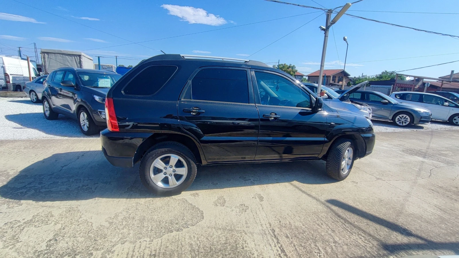 Kia Sportage 2.0i, снимка 4 - Автомобили и джипове - 55637490