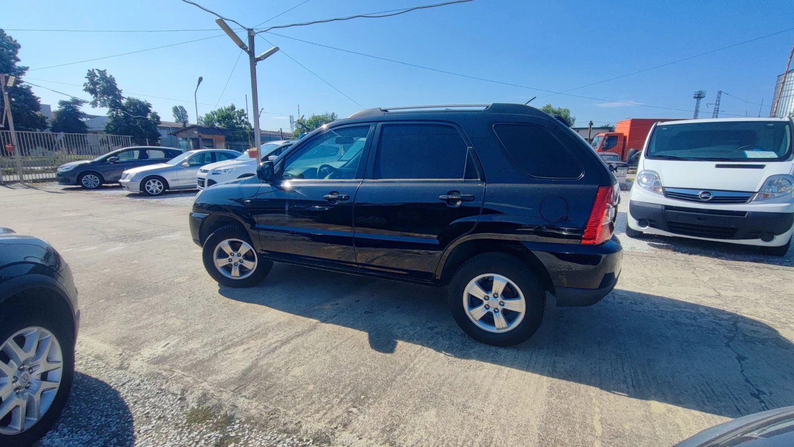 Kia Sportage 2.0i, снимка 8 - Автомобили и джипове - 55637490