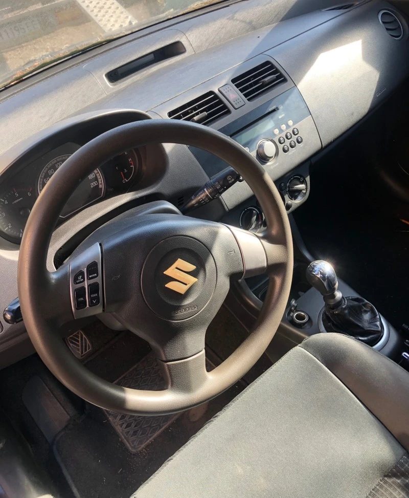 Suzuki Swift 1.3 d, снимка 7 - Автомобили и джипове - 42468697