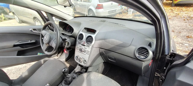 Opel Corsa 1.2 69кс a12xer, снимка 12 - Автомобили и джипове - 52143392