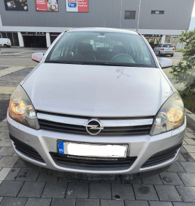 Opel Astra, снимка 1 - Автомобили и джипове - 45697678
