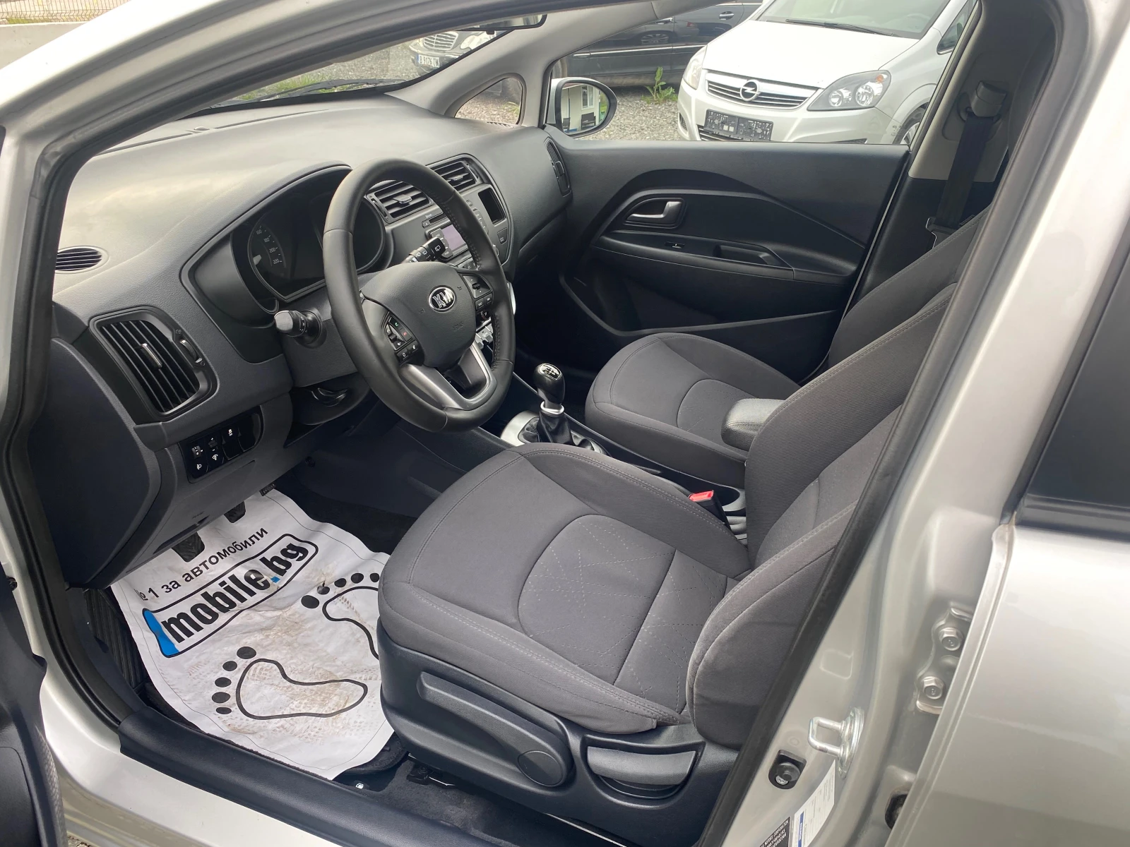 Kia Rio 1.1 ТОП, снимка 7 - Автомобили и джипове - 54417151