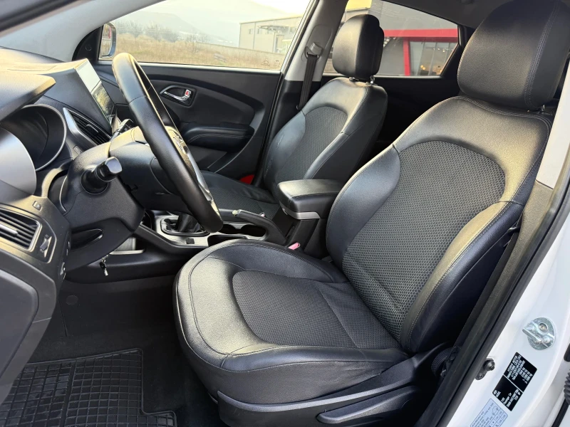 Hyundai IX35 1.7 CRDi / NAVI / CAMERA / KOJA / PODGREV / XENON, снимка 9 - Автомобили и джипове - 52840870