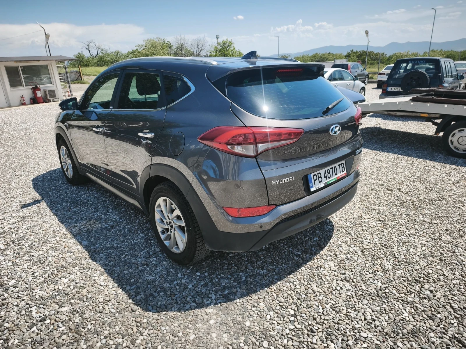 Hyundai Tucson 1.7CRDi Kamera, снимка 9 - Автомобили и джипове - 54701280