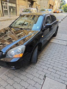 Kia Magentis, снимка 14 - Автомобили и джипове - 40388528