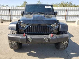 Jeep Wrangler Unlimited Rubicon 2014, снимка 5