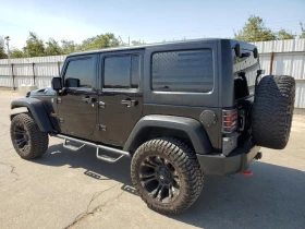 Jeep Wrangler Unlimited Rubicon 2014, снимка 2