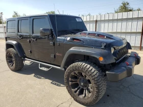 Jeep Wrangler Unlimited Rubicon 2014, снимка 4