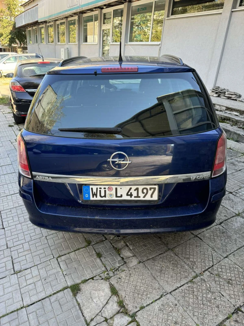 Opel Astra Комби, снимка 3 - Автомобили и джипове - 47682302