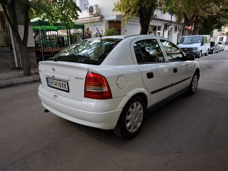 Opel Astra, снимка 7 - Автомобили и джипове - 52403399