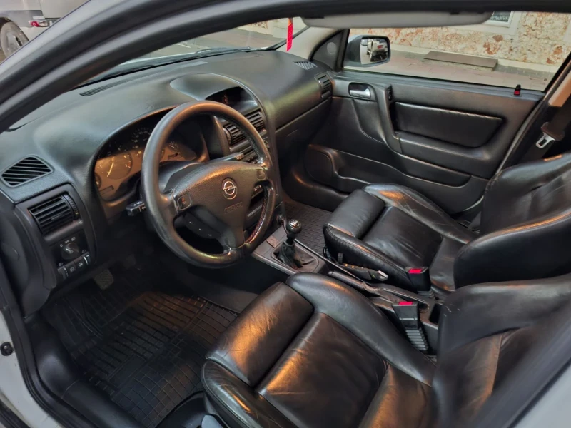 Opel Astra, снимка 12 - Автомобили и джипове - 52403399
