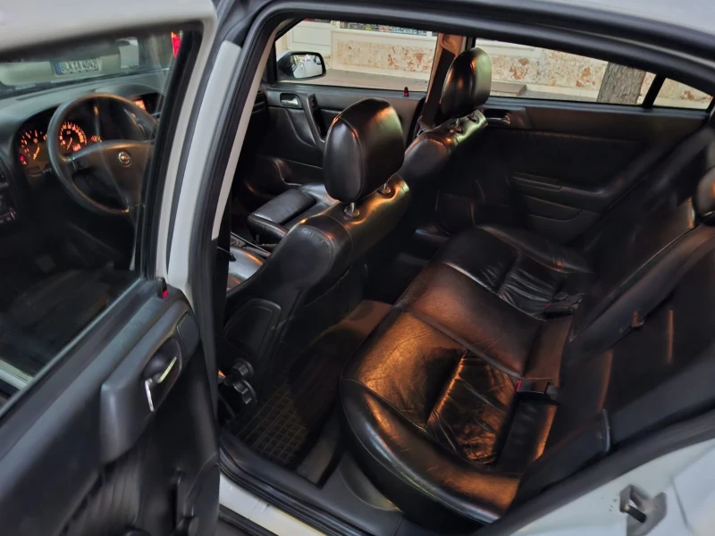 Opel Astra, снимка 11 - Автомобили и джипове - 52403399