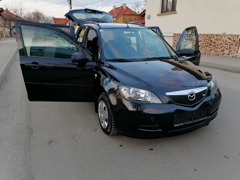 Mazda 2 1.4 дизел клима , снимка 4 - Автомобили и джипове - 49566514