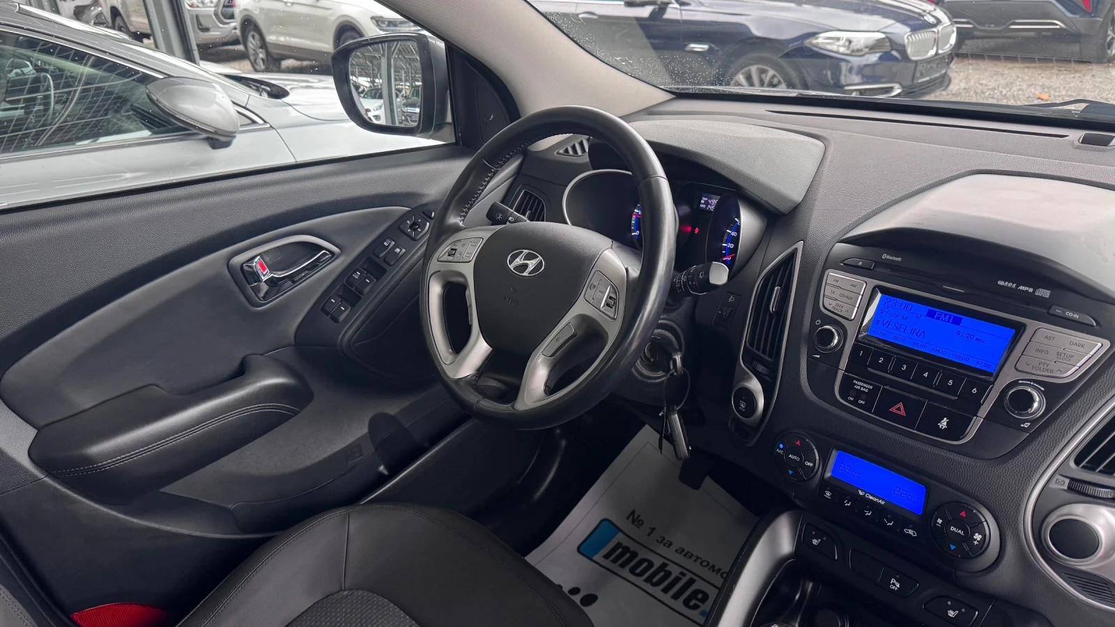 Hyundai IX35 2.0CRDI AWD 136кс, снимка 12 - Автомобили и джипове - 56748518