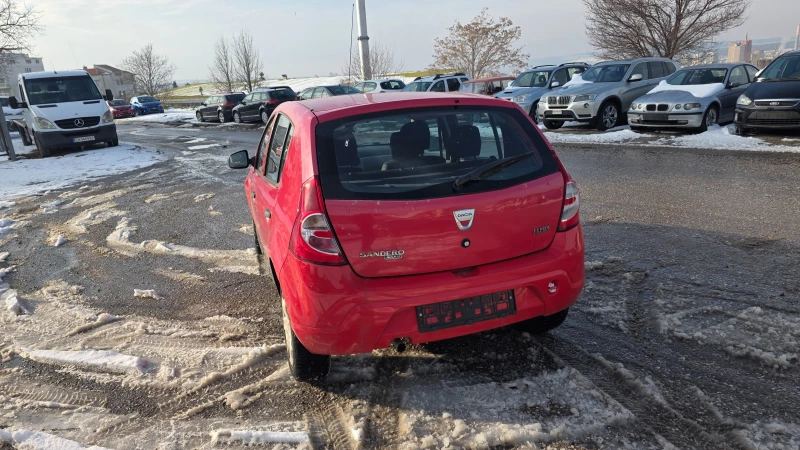 Dacia Sandero 1.4i, снимка 12 - Автомобили и джипове - 52239509
