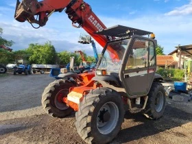 Телескопични товарачи Manitou Mvt935, снимка 1