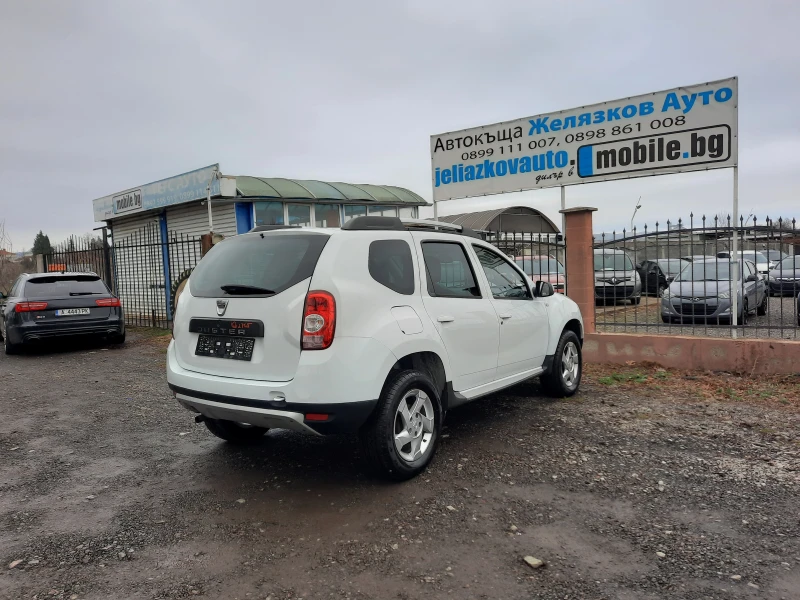 Dacia Duster 1.6i, снимка 4 - Автомобили и джипове - 48269647