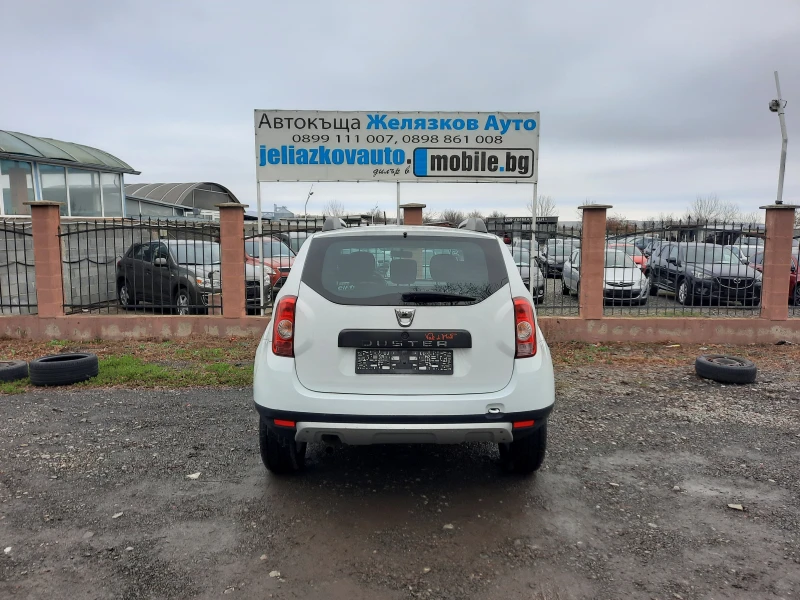 Dacia Duster 1.6i, снимка 5 - Автомобили и джипове - 48269647