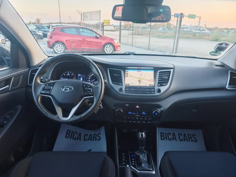 Hyundai Tucson 2.0 CRDI 4X4 , снимка 12 - Автомобили и джипове - 52265156