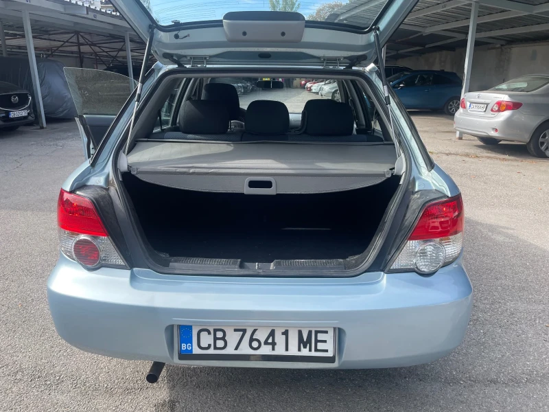 Subaru Impreza 1.6i Автоматик (Швейцария), снимка 5 - Автомобили и джипове - 47314021