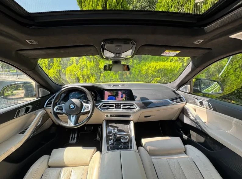 BMW X6 M50i xDrive 700 к.с. - изображение 7