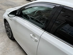 Toyota Auris 1.8 Hybrid 99kc, снимка 7