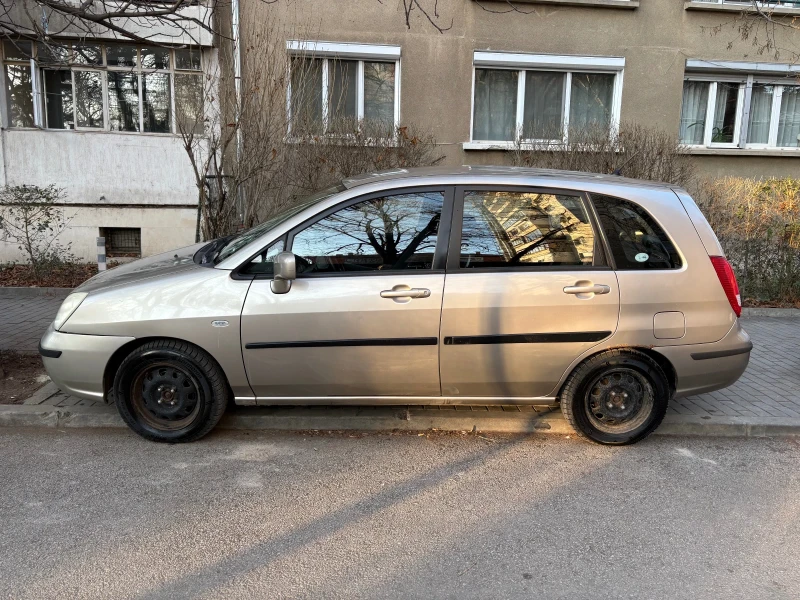 Suzuki Liana, снимка 5 - Автомобили и джипове - 49010167