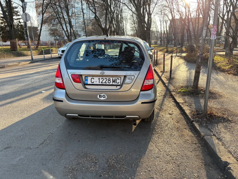 Suzuki Liana, снимка 13 - Автомобили и джипове - 49010167