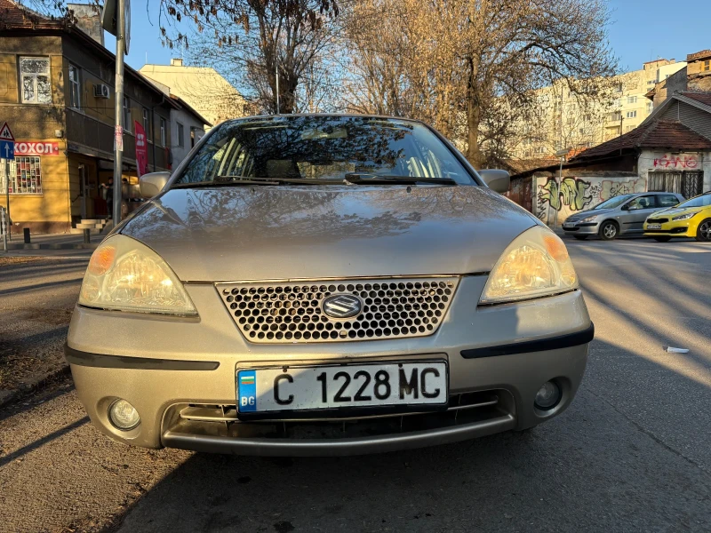 Suzuki Liana, снимка 12 - Автомобили и джипове - 49010167