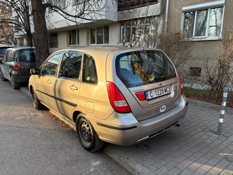 Suzuki Liana, снимка 4 - Автомобили и джипове - 49010167