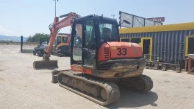      Kubota KX080-4 