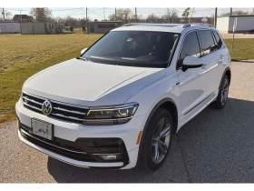VW Tiguan Highline 4MOTION /CARFAX/ПОДГРЕВ/ПАМЕТ/ПАНОРАМА