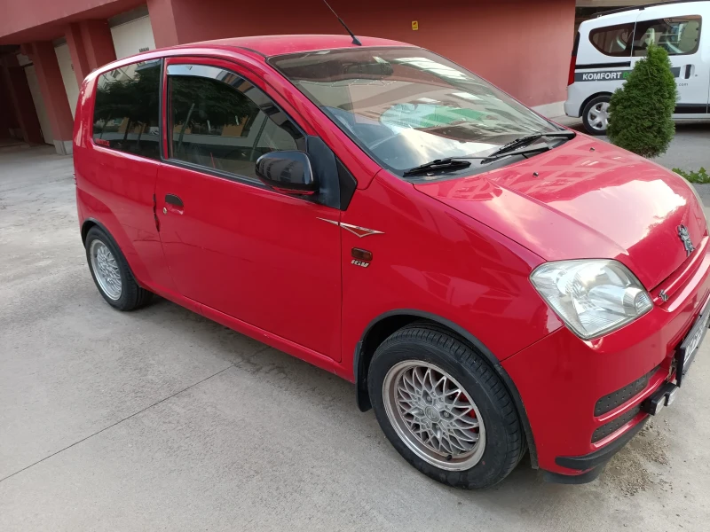 Daihatsu Cuore, снимка 9 - Автомобили и джипове - 51810108
