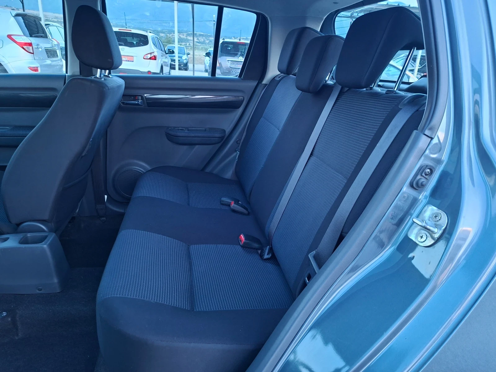 Suzuki Swift 1, 3 I 4x4, снимка 12 - Автомобили и джипове - 55334939