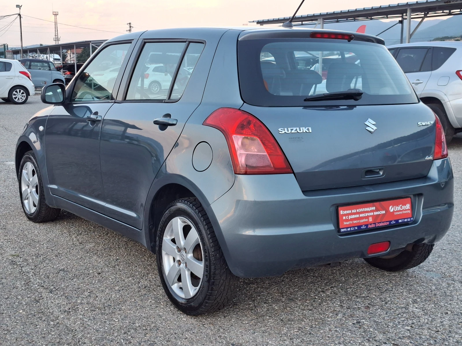 Suzuki Swift 1, 3 I 4x4, снимка 7 - Автомобили и джипове - 55334939