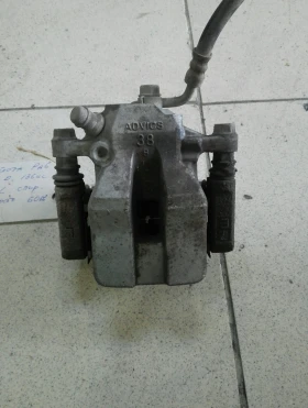 Спирачен апарат заден ляв Тойота Рав4 2.2д