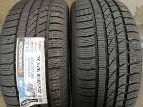 Гуми Зимни 235/50R18, снимка 1 - Гуми и джанти - 39345117