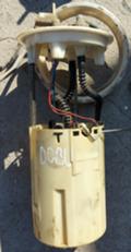 Помпа в резервоар с кошница  за  Fiat Doblo, снимка 1 - Части - 33328570