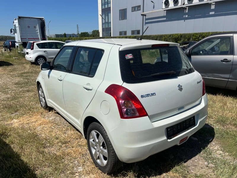 Suzuki Swift 1.3 4Х4, снимка 7 - Автомобили и джипове - 50409600
