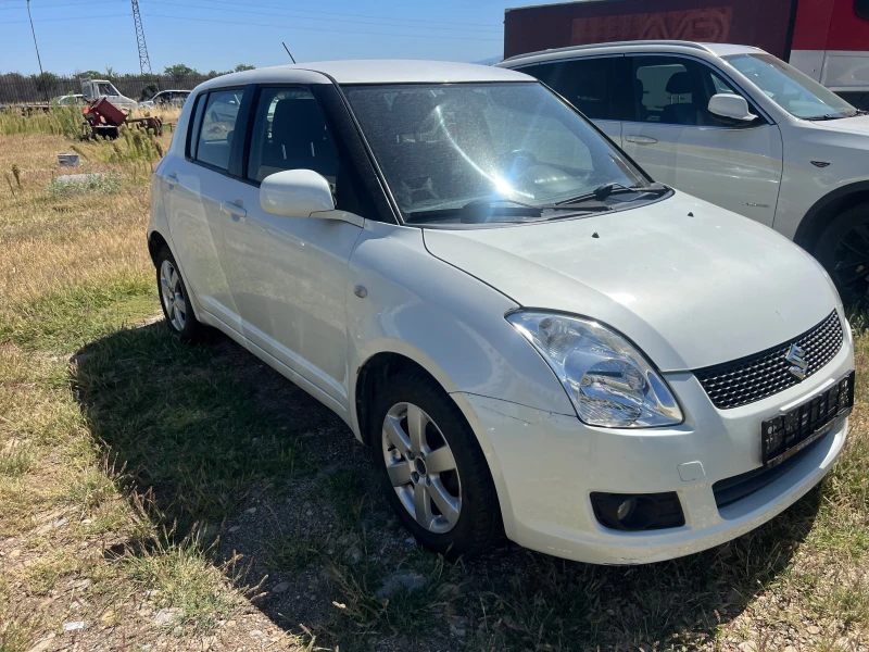 Suzuki Swift 1.3 4Х4, снимка 3 - Автомобили и джипове - 50409600