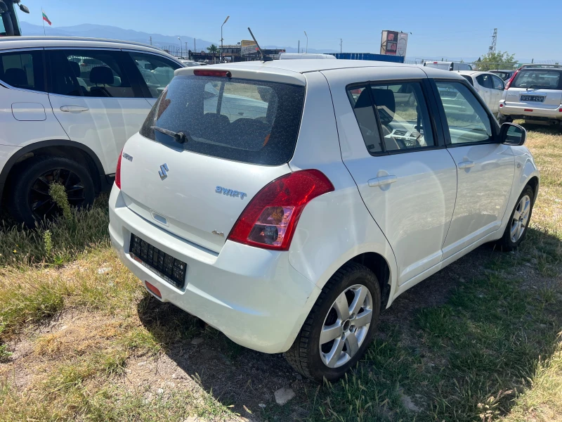 Suzuki Swift 1.3 4Х4, снимка 5 - Автомобили и джипове - 50409600