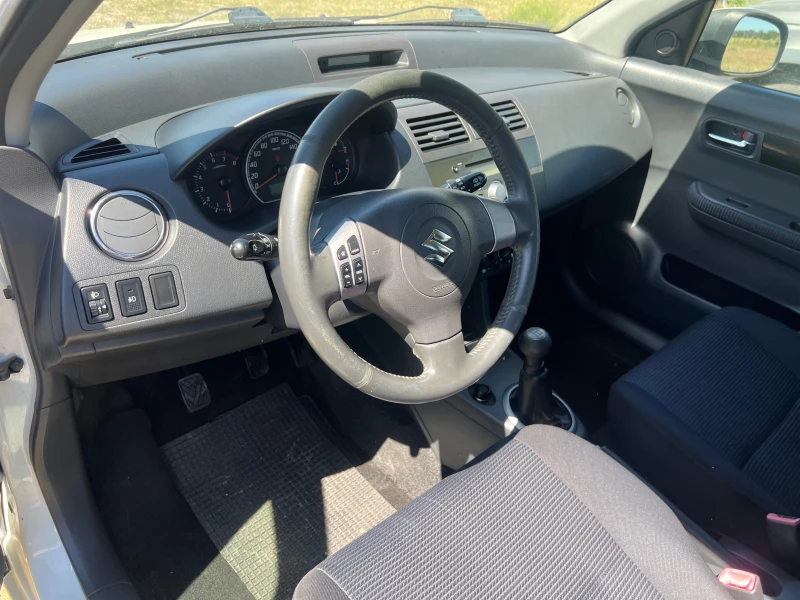 Suzuki Swift 1.3 4Х4, снимка 9 - Автомобили и джипове - 50409600