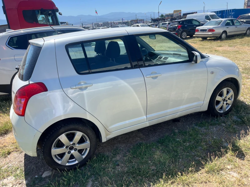 Suzuki Swift 1.3 4Х4, снимка 4 - Автомобили и джипове - 50409600