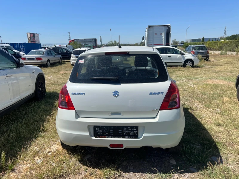 Suzuki Swift 1.3 4Х4, снимка 6 - Автомобили и джипове - 50409600