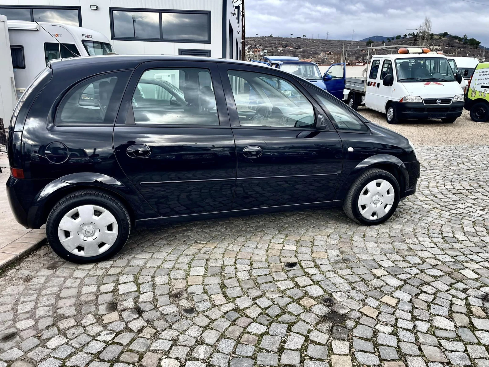 Opel Meriva 1.6 - изображение 6