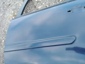 Лайсна врата задна лява Опел Зафира Б (1)